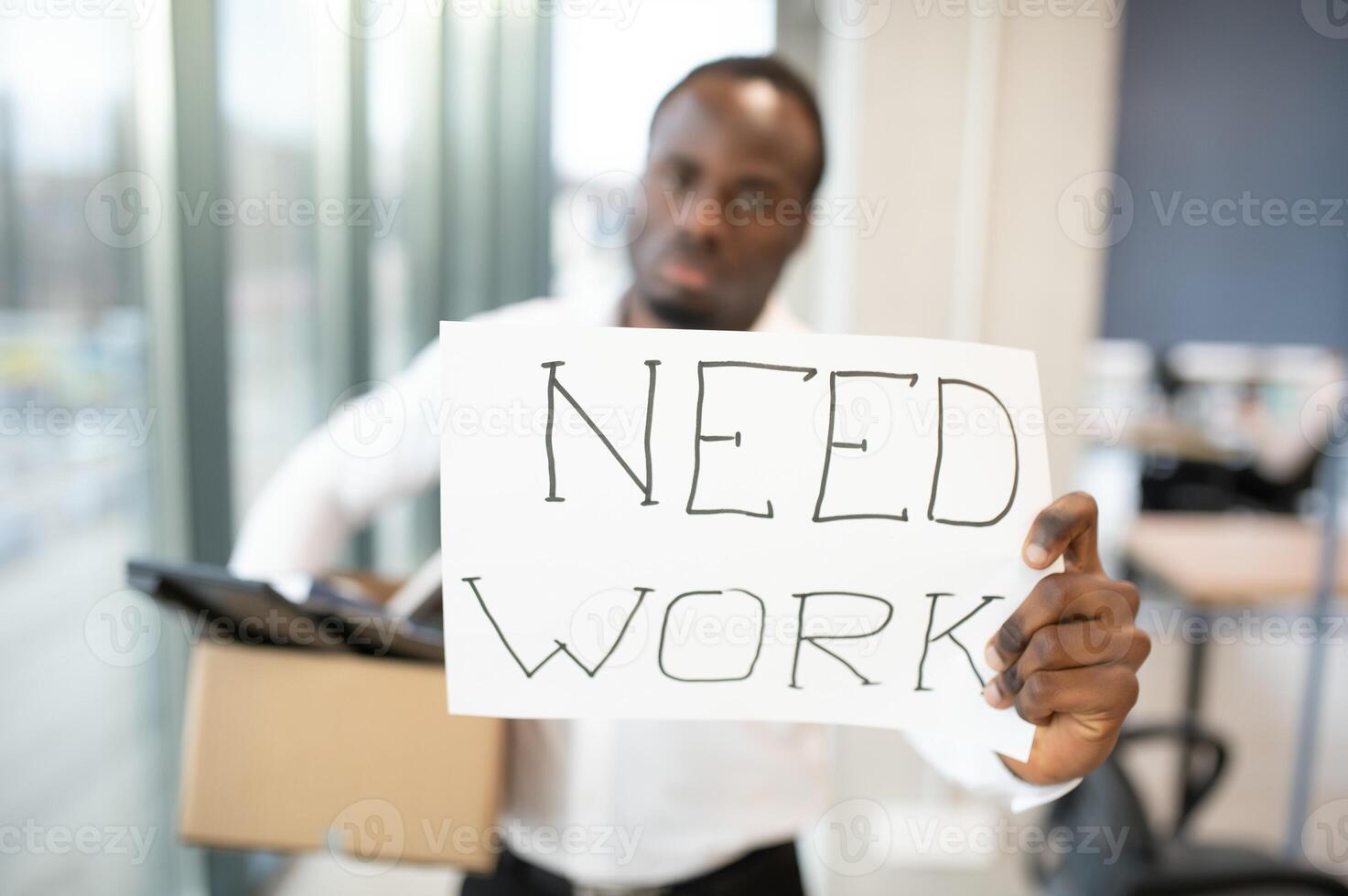 Portrait of african american employee being fired. photo