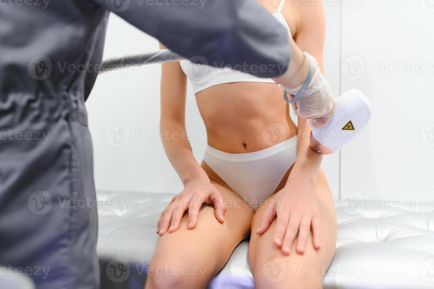 Laser hair removal on ladies hand. photo