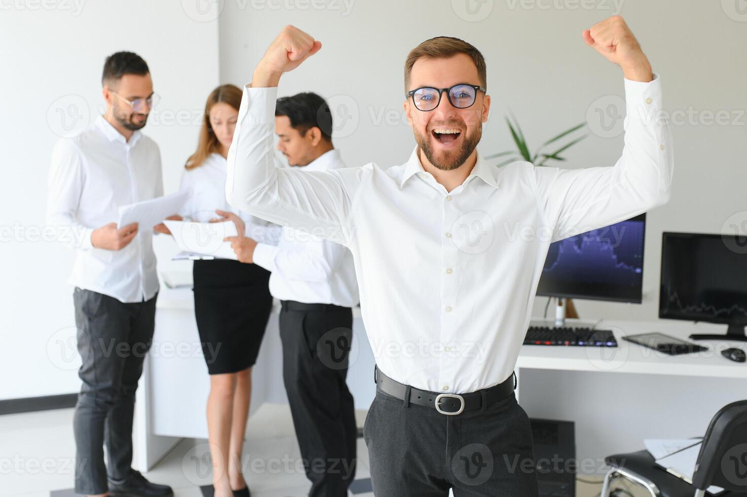 Business people stand on the background of the office corridor photo