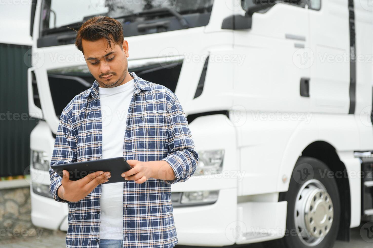 Portrait of a indian truck driver photo