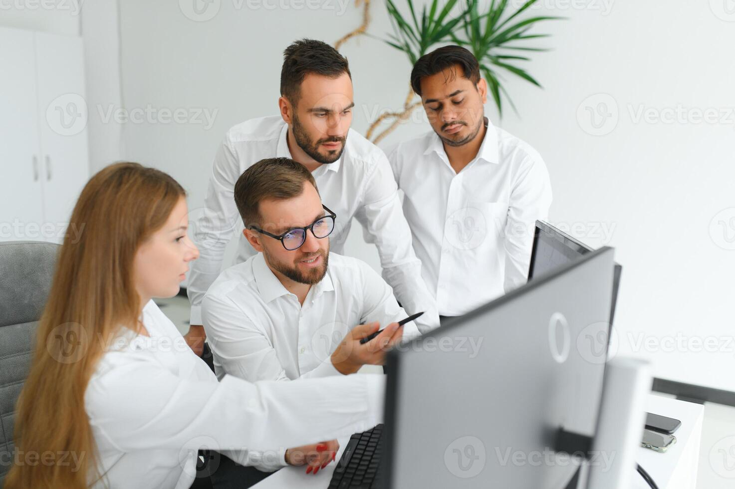 Business team working on their business project together at office. photo