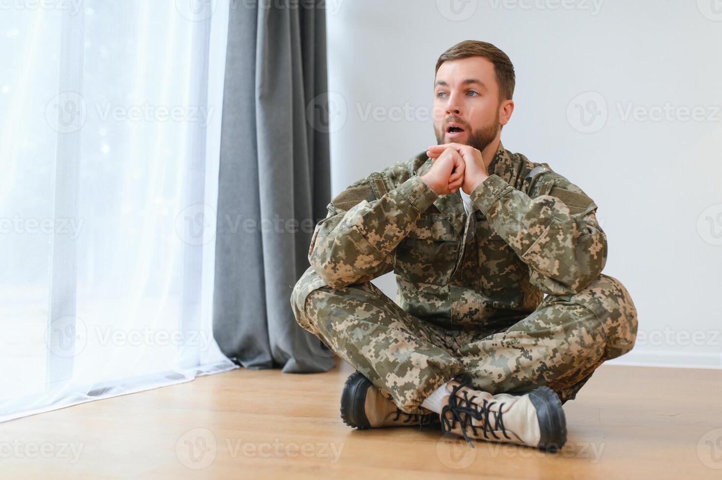Military veteran with post traumatic stress disorder screaming at home photo