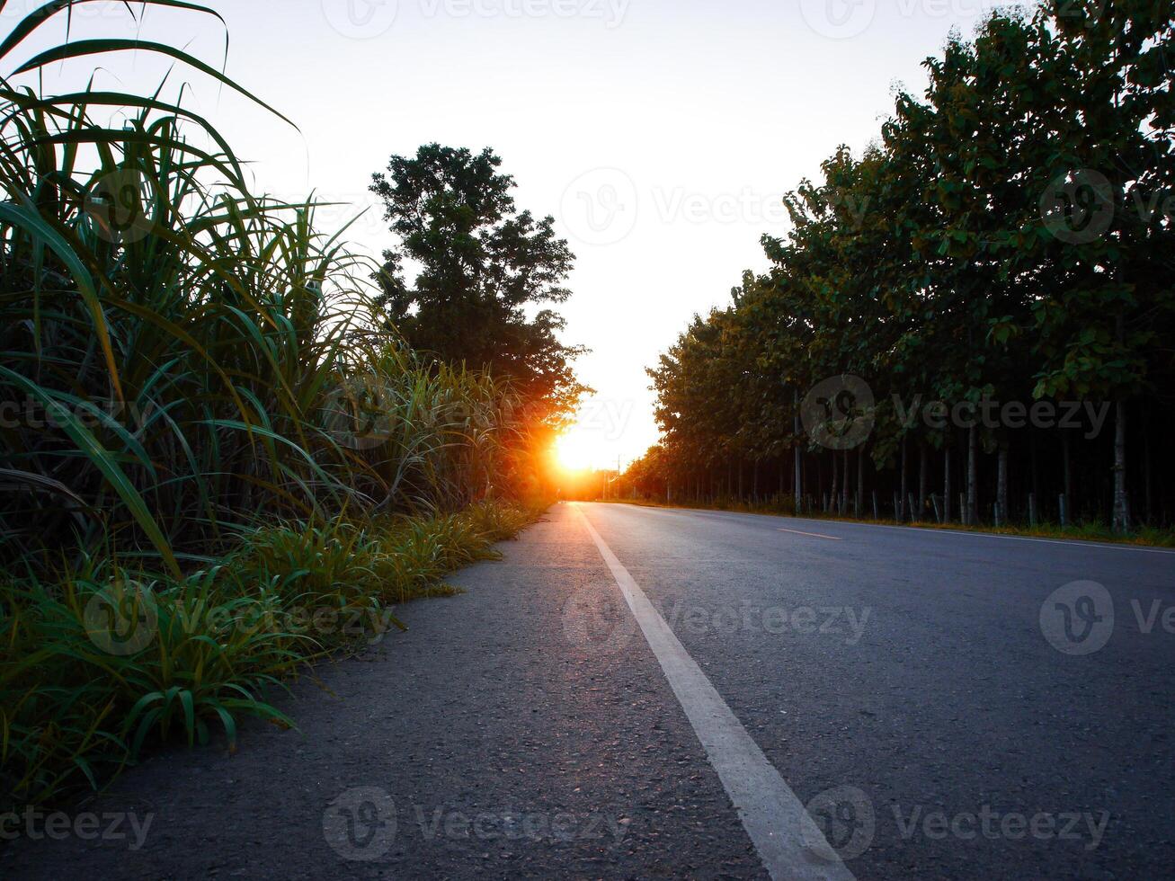 Spectacular sunset over, orange sun rising up over the horizon photo