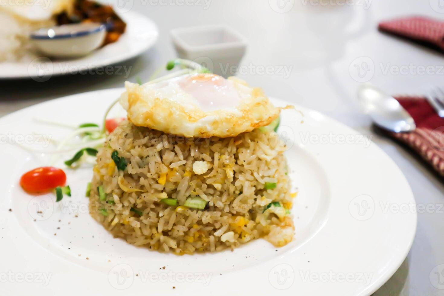stir-fried rice, stir fried rice or fried rice with sunny side up egg or fried egg photo