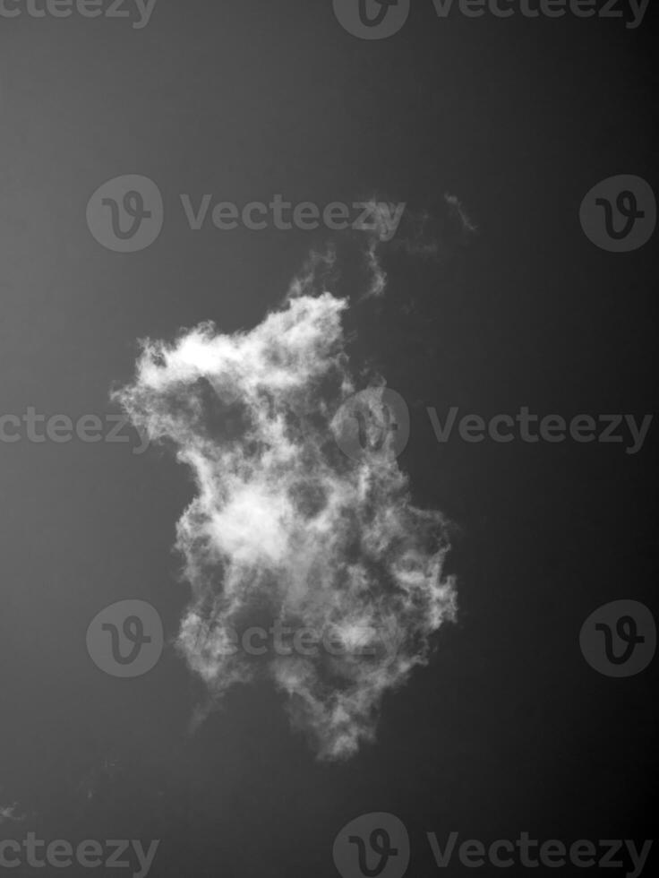 Black and white clouds in the sky background photo