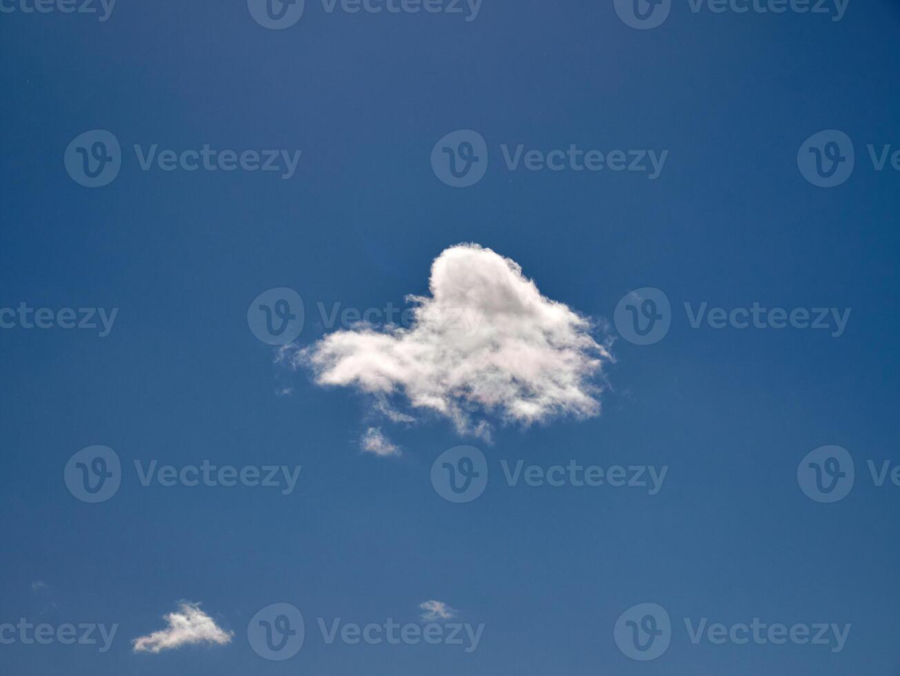 White fluffy clouds in the sky background. Cumulus clouds photo