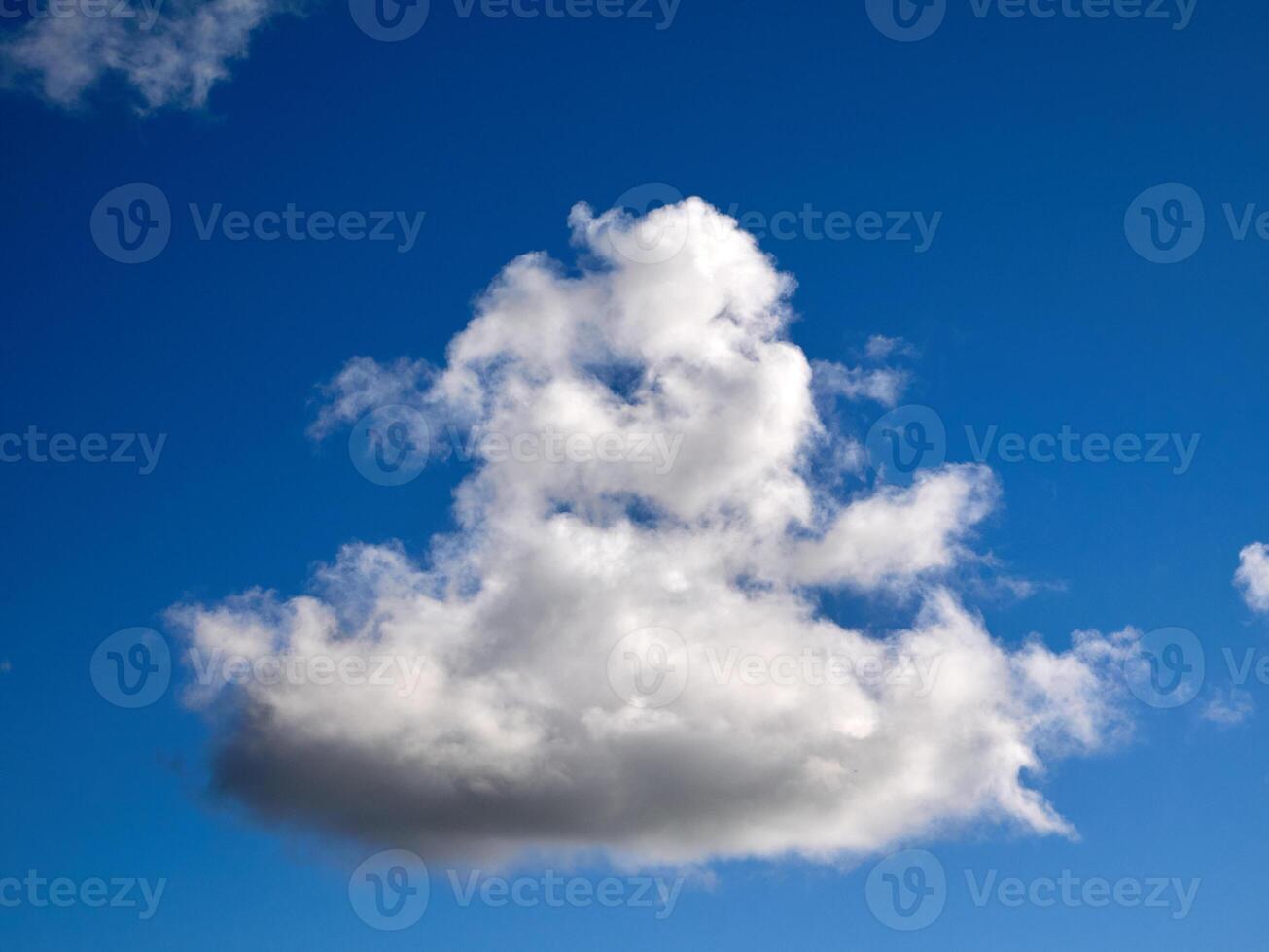 White fluffy clouds in the sky background. Cumulus clouds photo