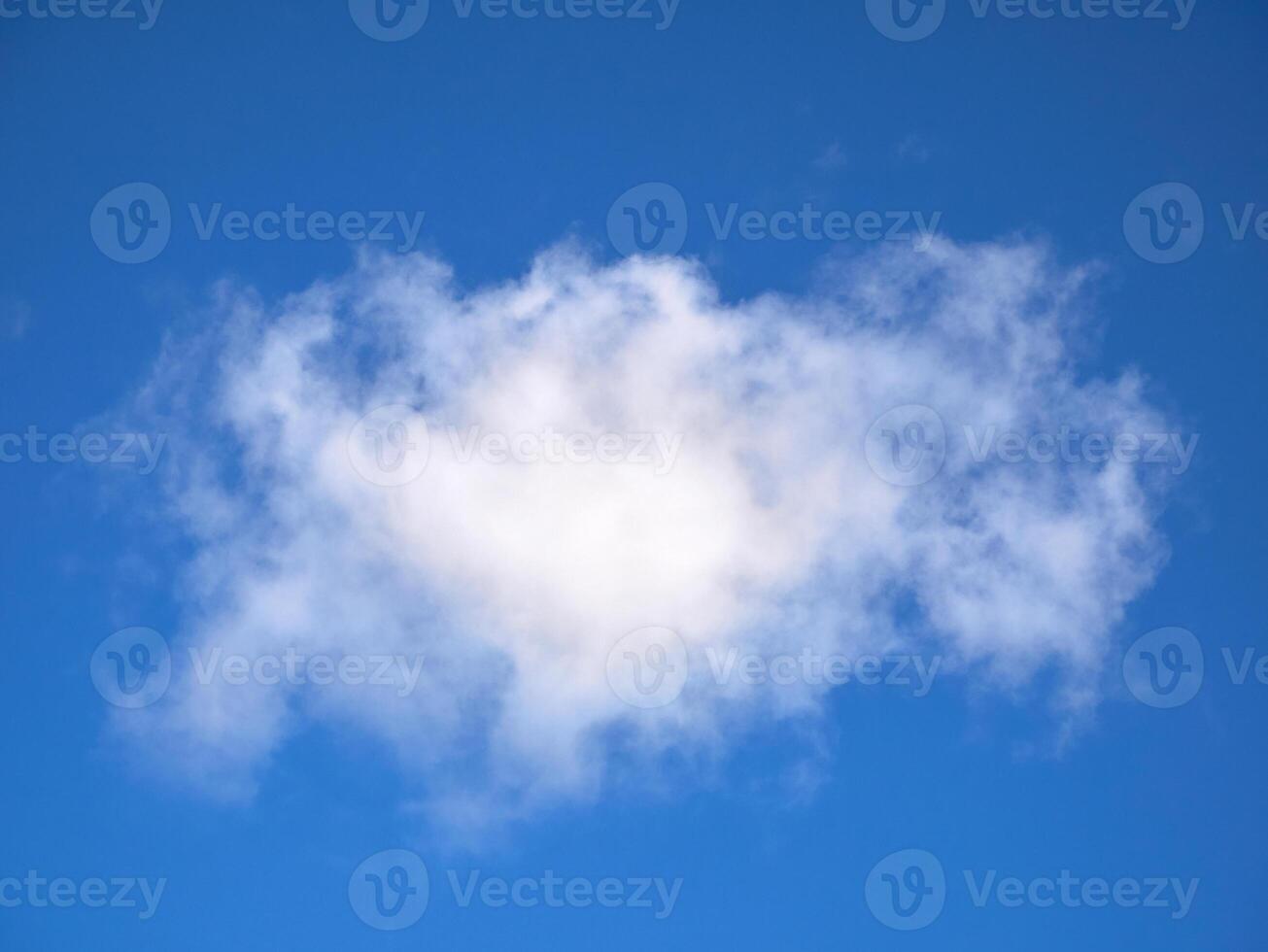Cumulus clouds in the sky. Fluffy cloud shapes photo