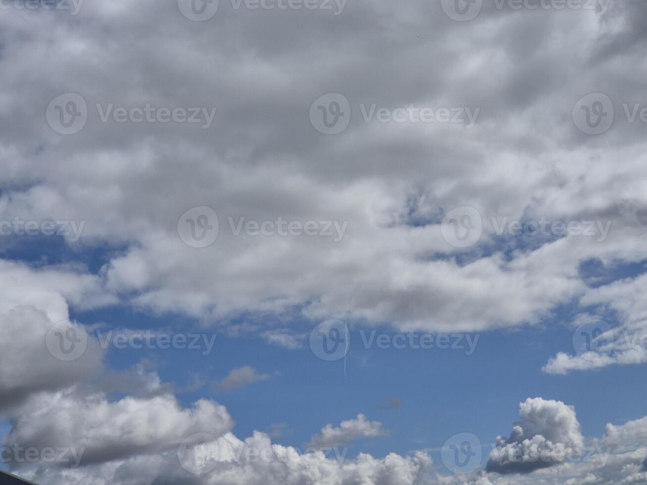 White fluffy clouds in the sky background. Cumulus clouds photo