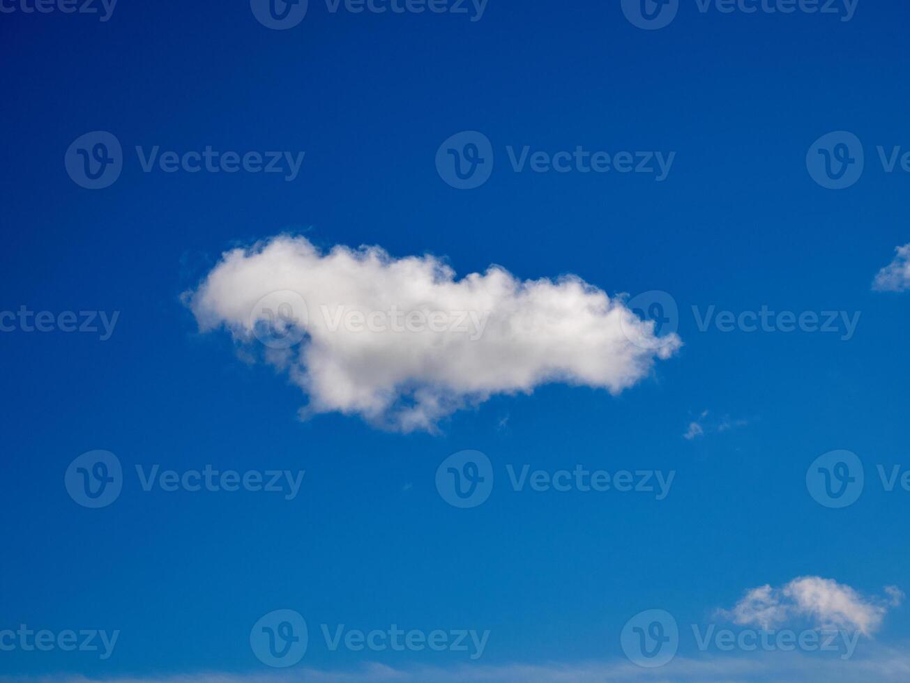 White fluffy clouds in the sky background. Cumulus clouds photo