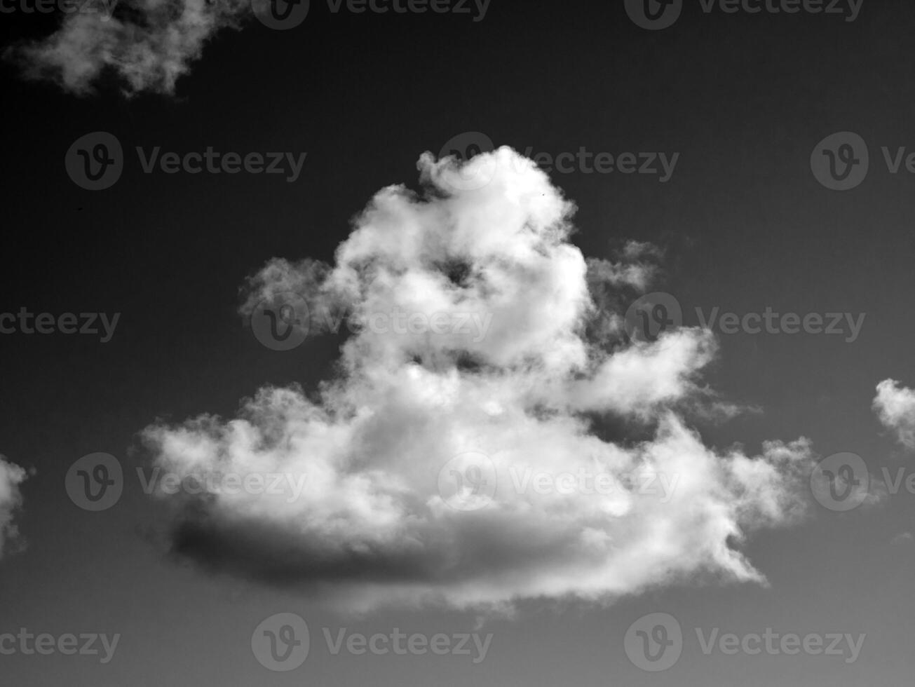 Black and white clouds in the sky background photo