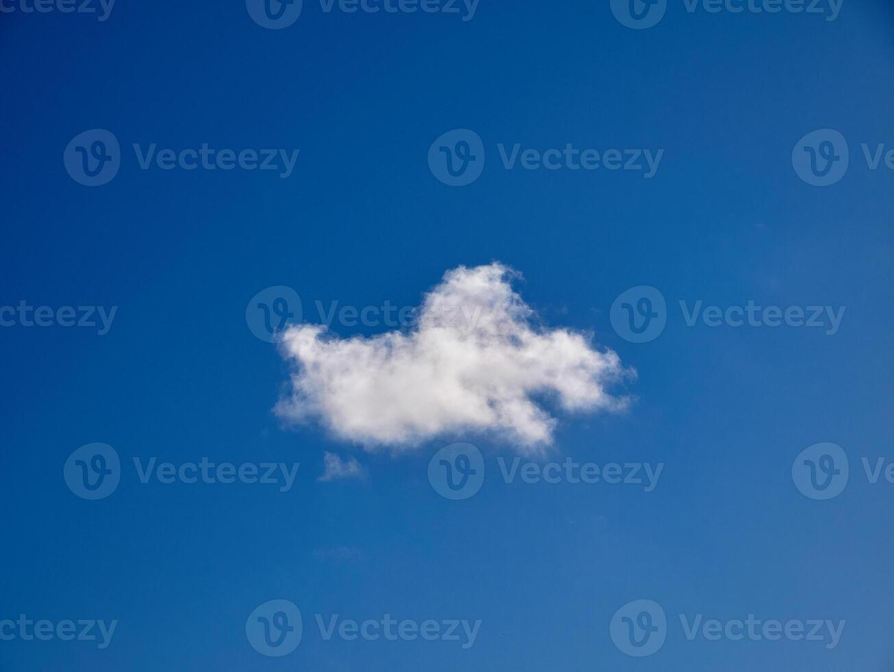 White fluffy clouds in the sky background. Cumulus clouds photo