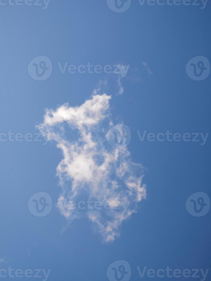 Cumulus clouds in the sky. Fluffy cloud shapes photo