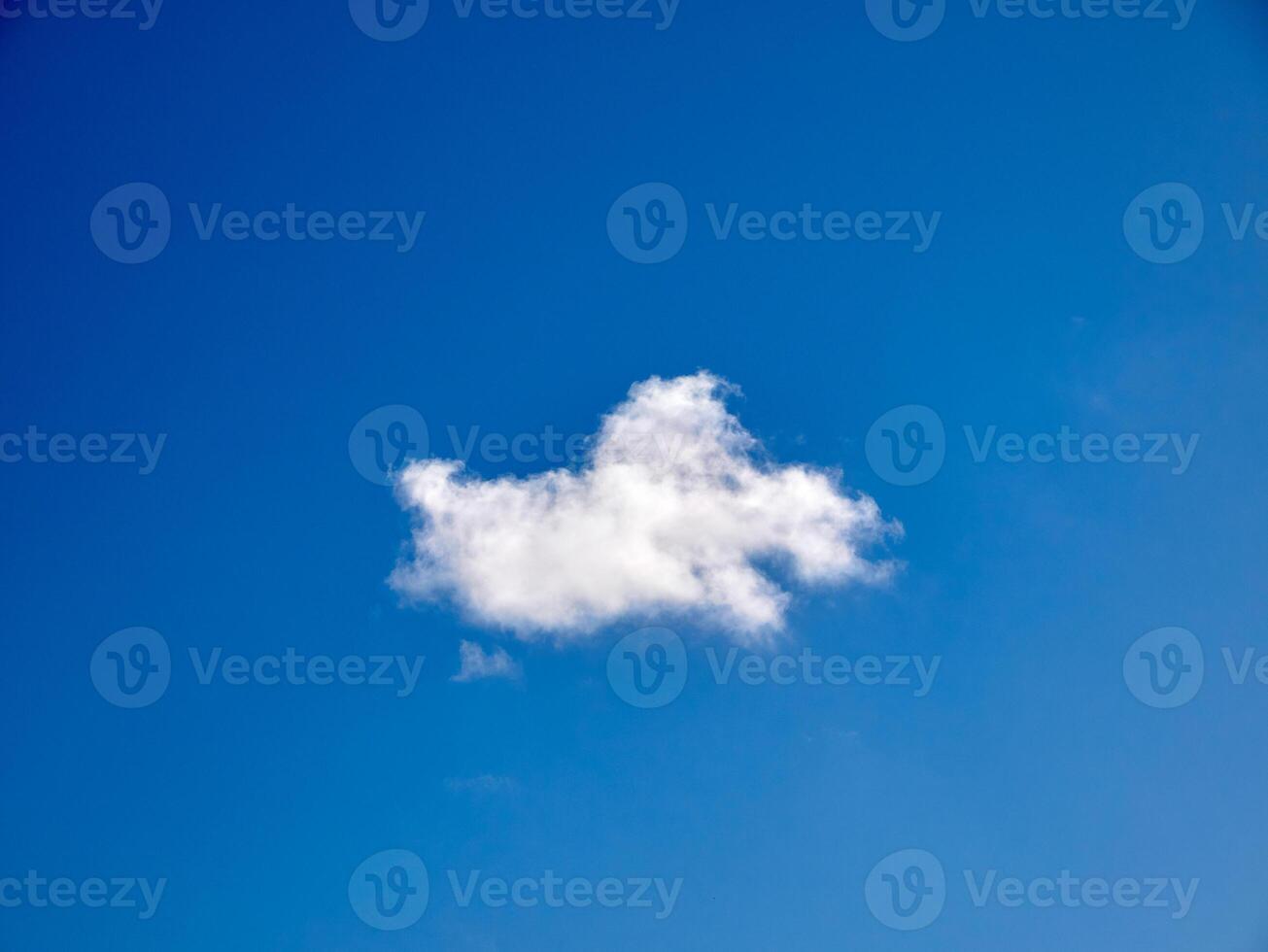 Cumulus clouds in the sky. Fluffy cloud shapes photo