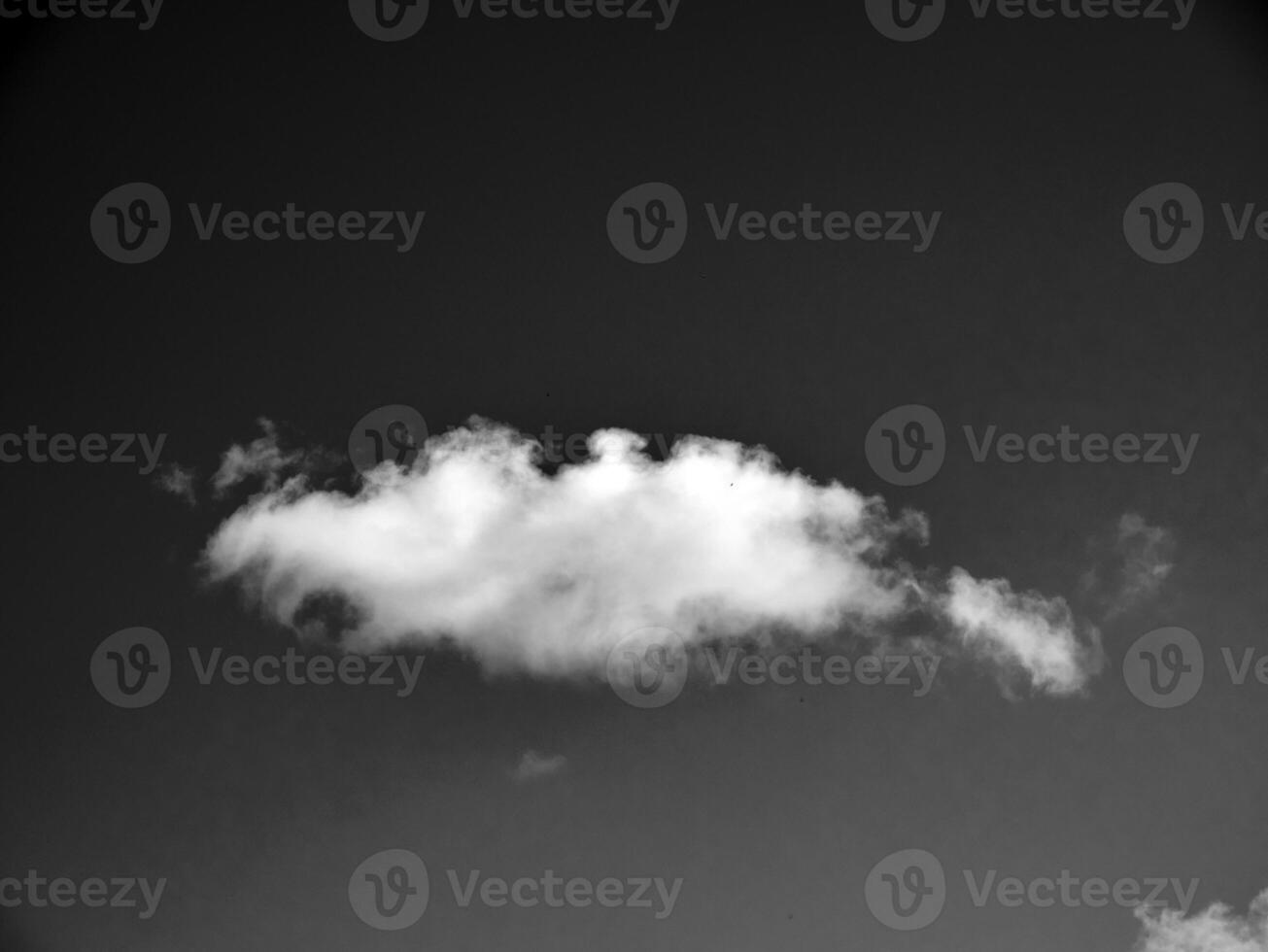 Black and white clouds in the sky background photo