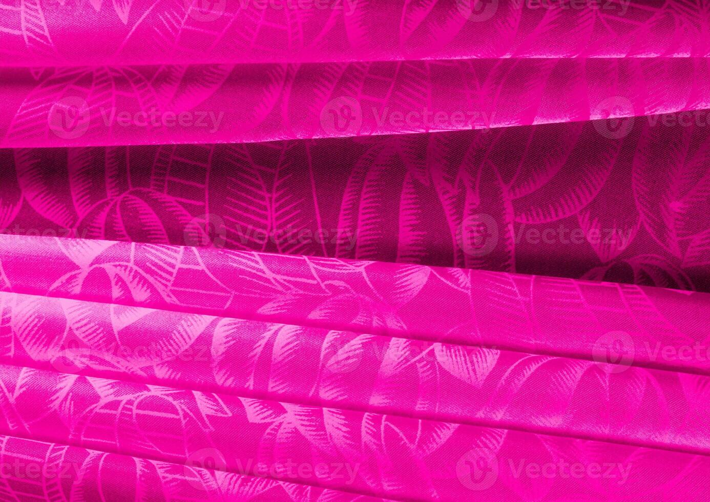 Red cloth pattern close view, textile material background photo