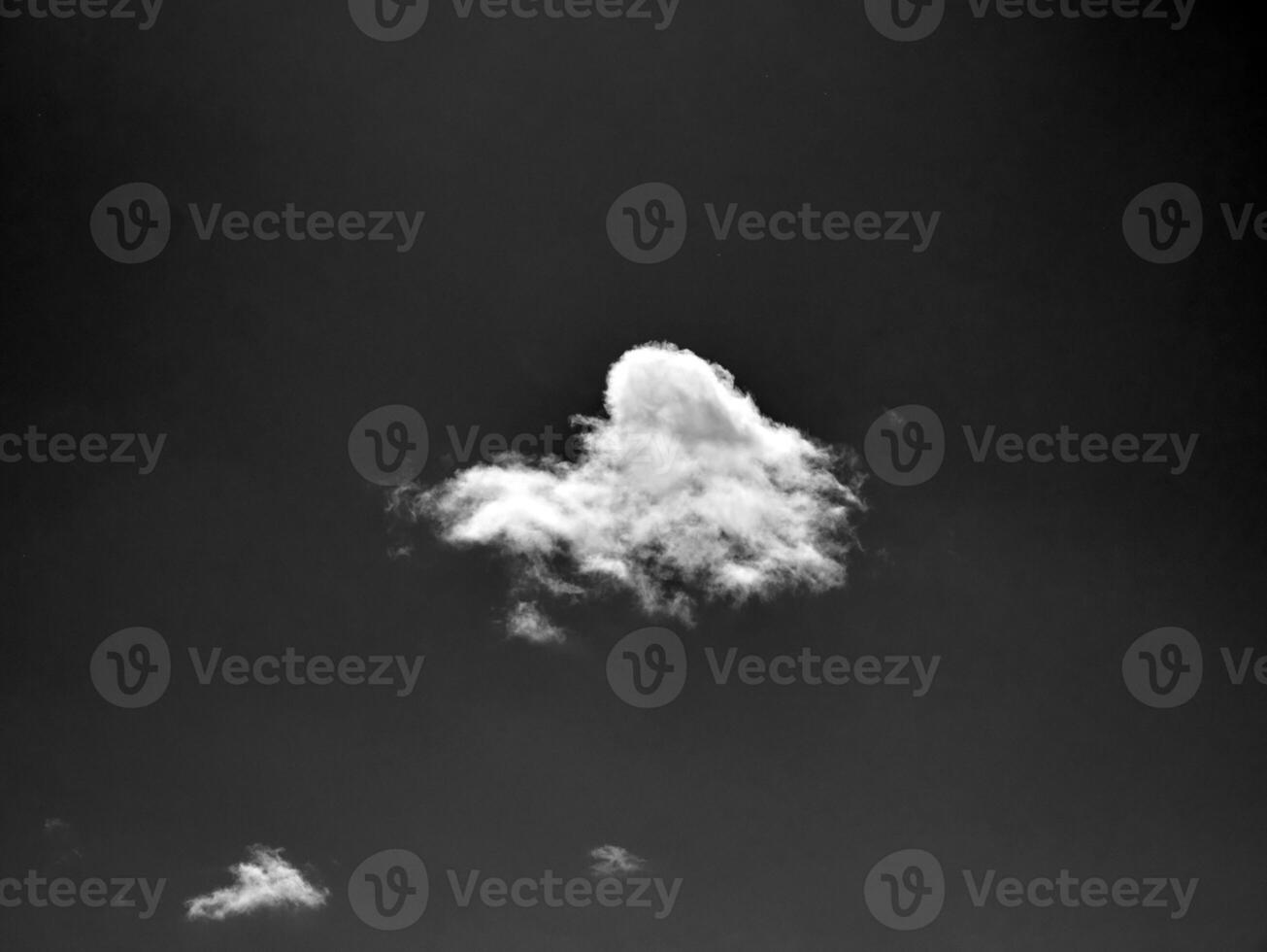 Black and white clouds in the sky background photo