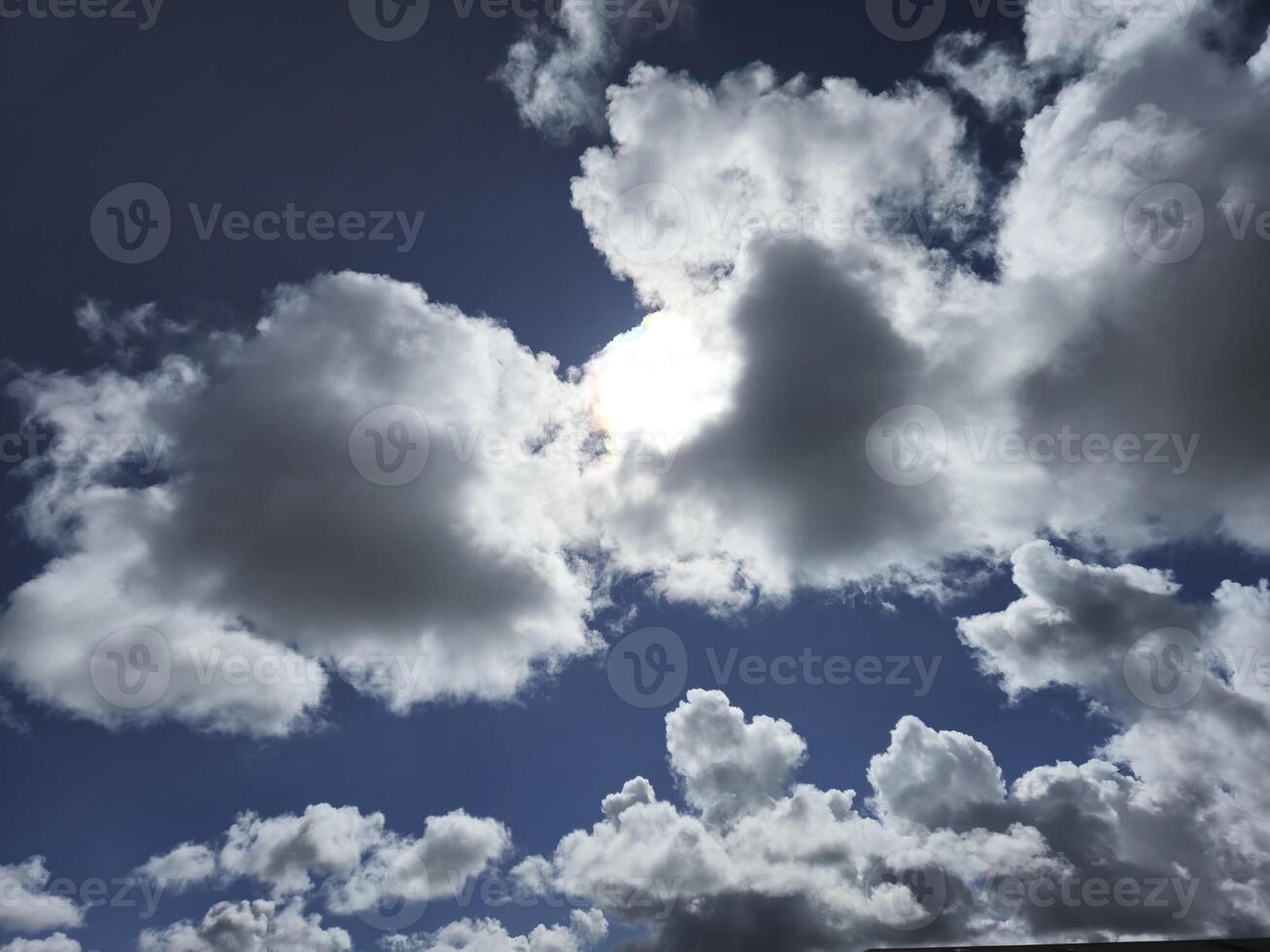 White fluffy clouds in the sky background. Cumulus clouds photo