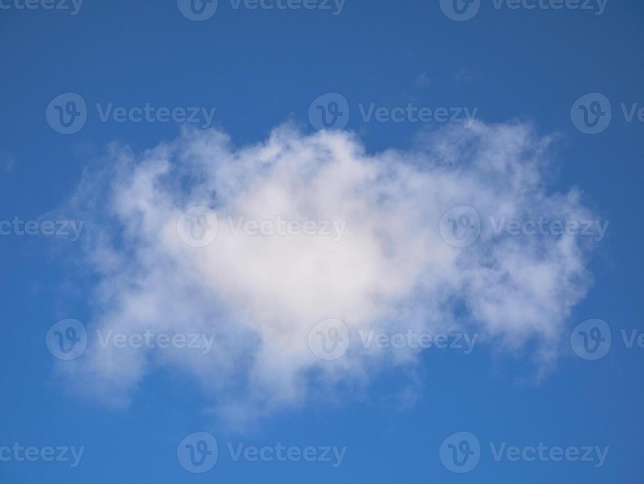 White fluffy clouds in the sky background. Cumulus clouds photo