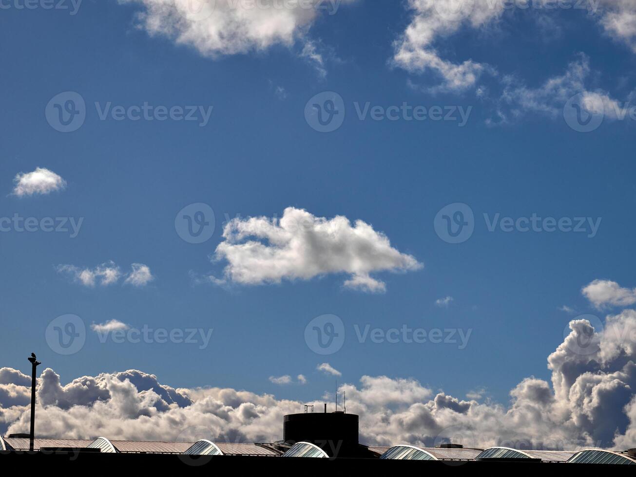 White fluffy clouds in the sky background. Cumulus clouds photo