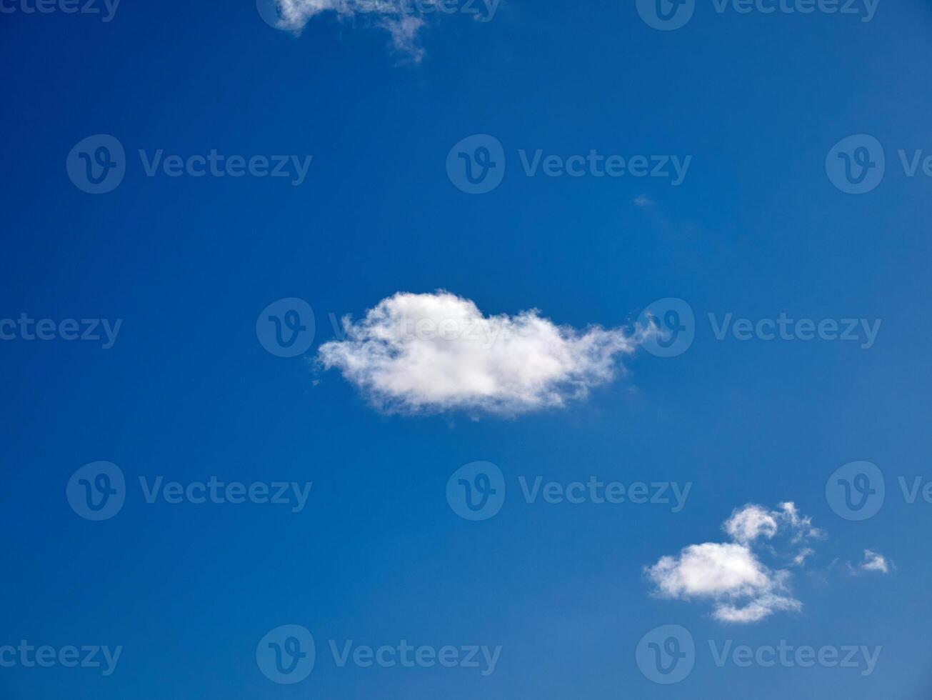 White fluffy clouds in the sky background. Cumulus clouds photo
