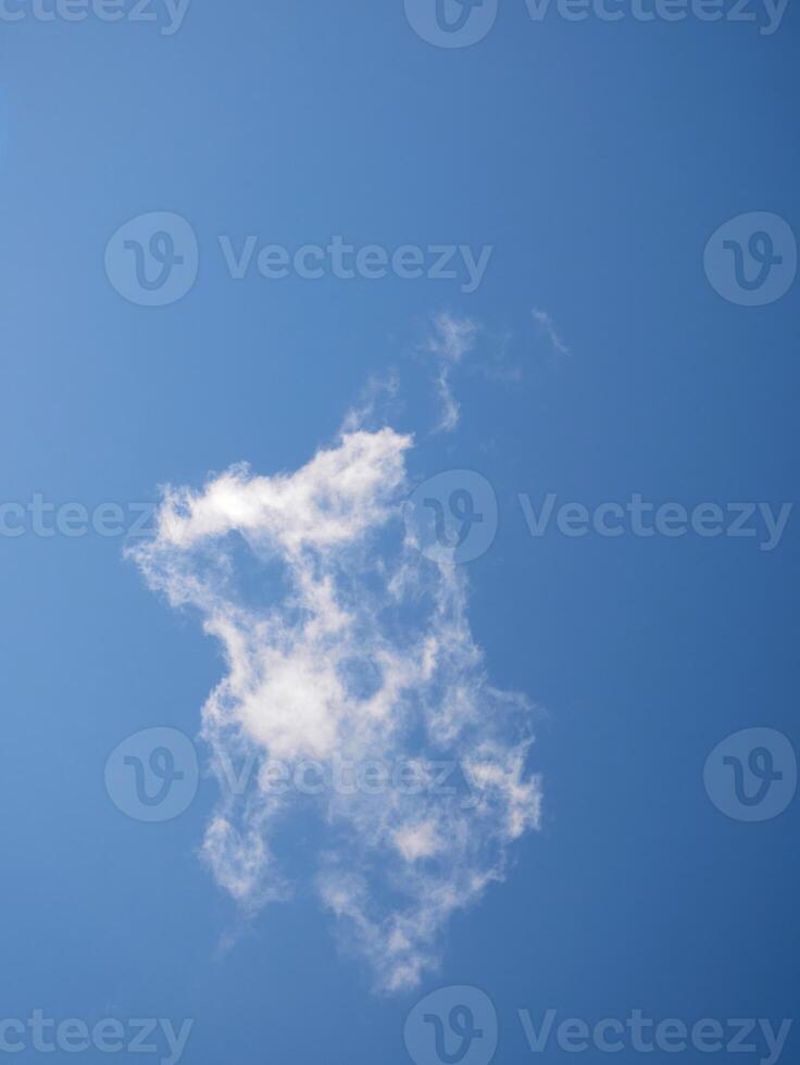 Cumulus clouds in the sky. Fluffy cloud shapes photo