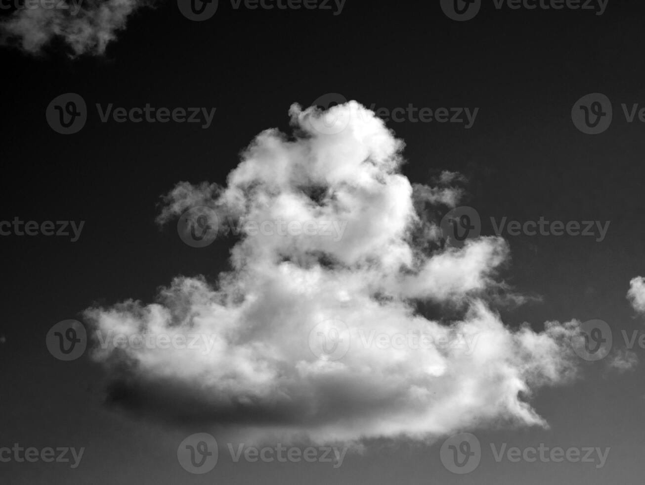 Black and white clouds in the sky background photo