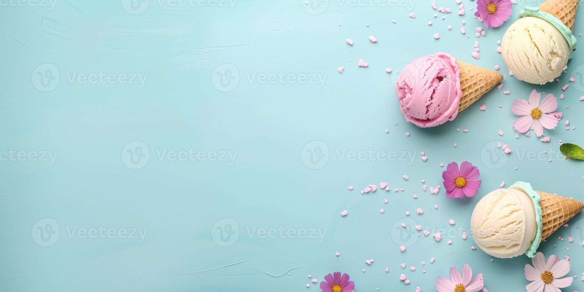 Ice cream balls in a cone on an empty blue background with flowers. Summer background with ice cream and copy space. Summer time composition for web banner, cards, invitations photo