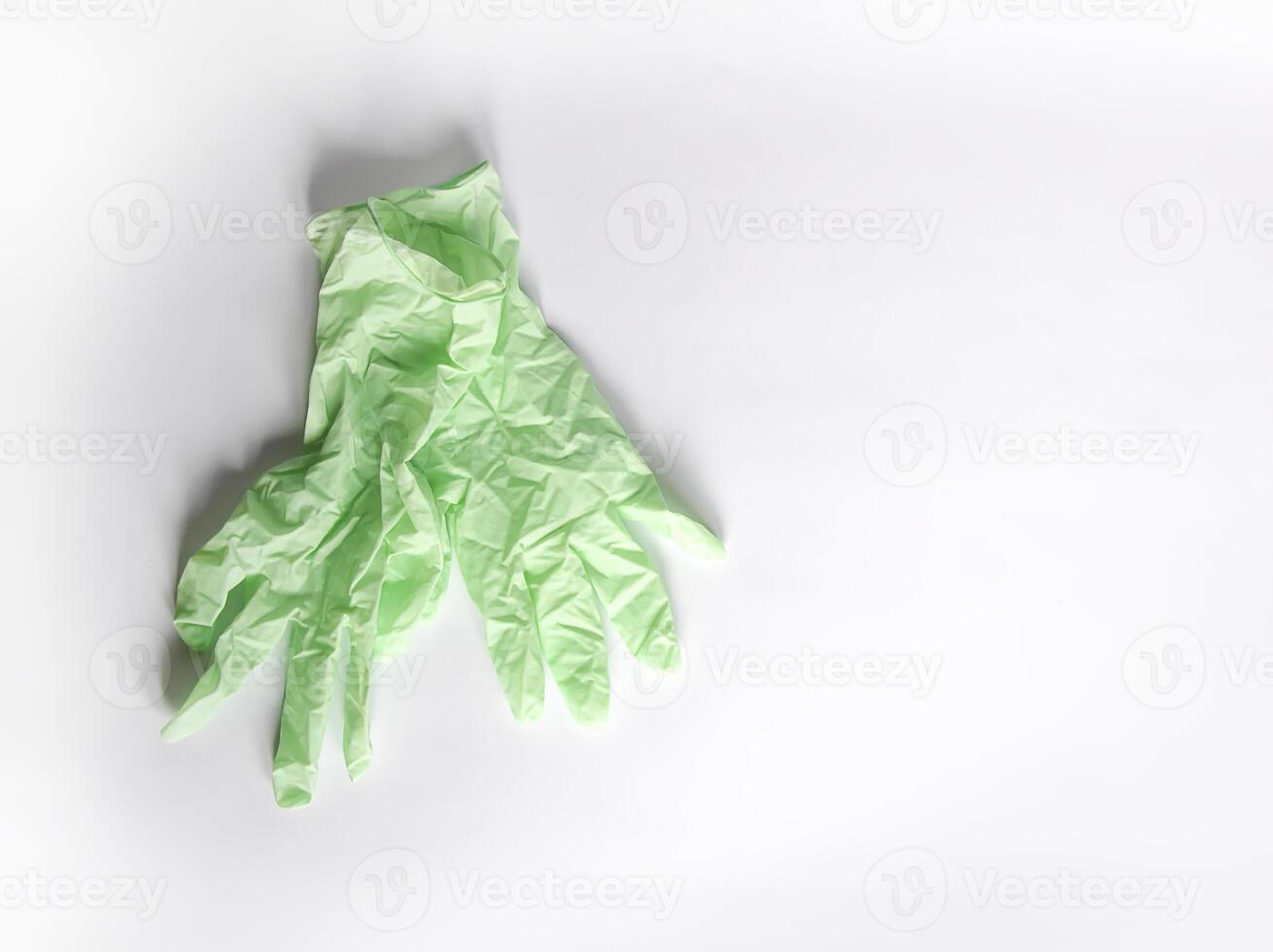 Rubber gloves on light background photo