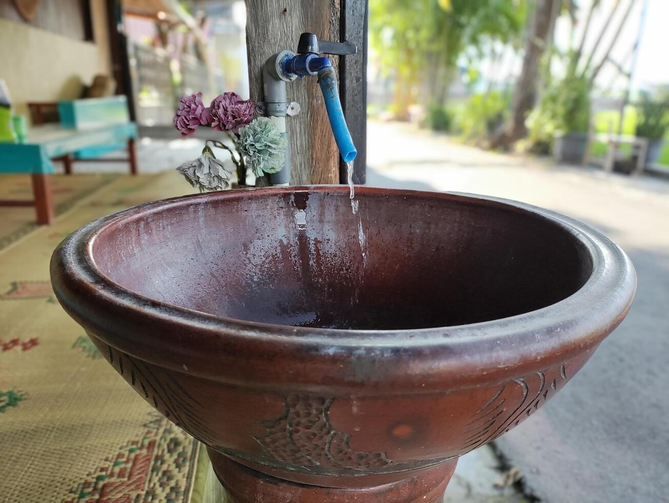 hands washing place at the food stall photo