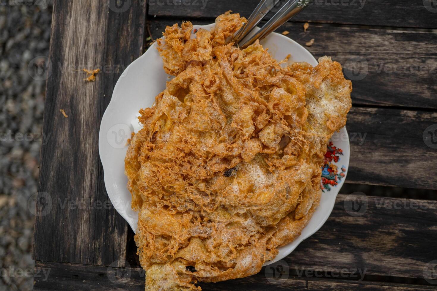 A plate of scramble eggs of Javanese traditional food. The photo is suitable to use for traditional food background and snack content media