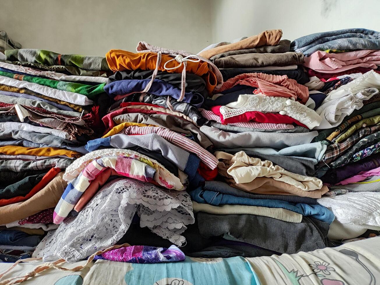low angle view of household clothes arranged in a pile photo