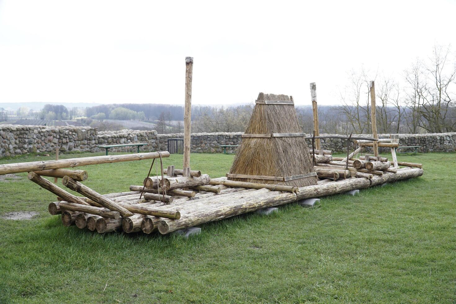 Czersk, Poland - March 24th, 2024 - Wooden raft on courtyard at Masovian Dukes Castle photo