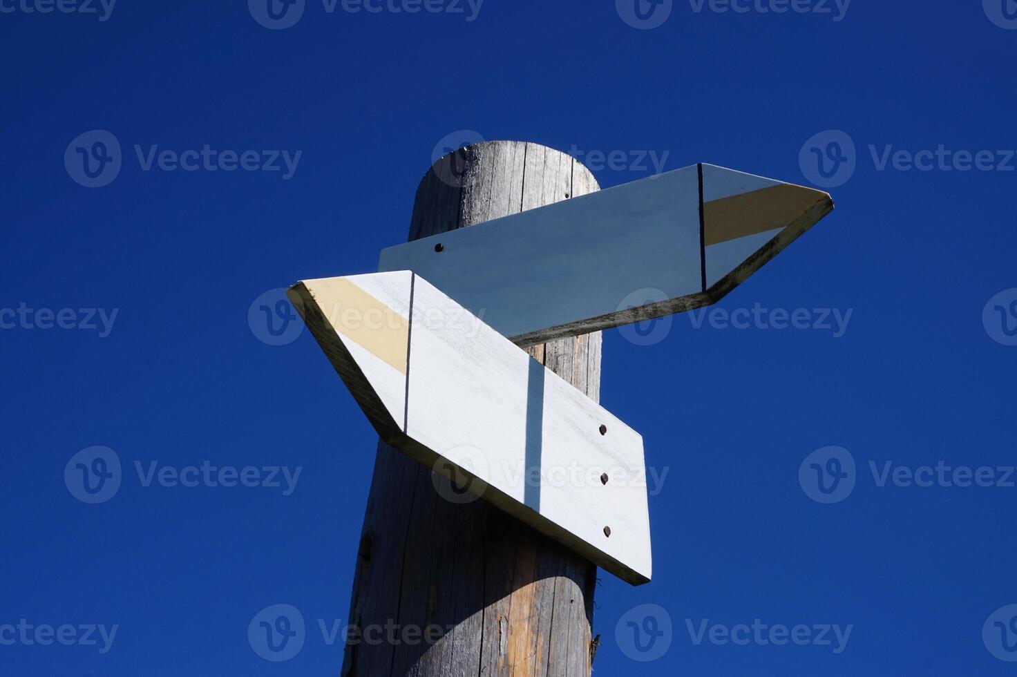 Wooden Signpost with Two Arrows photo
