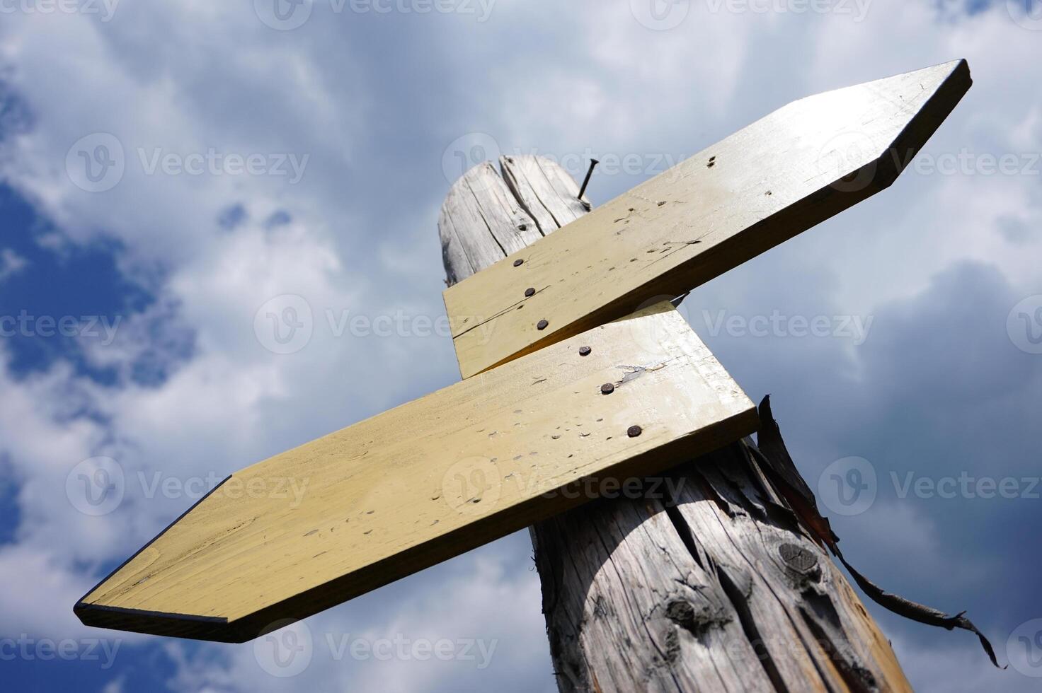 Wooden Signpost with Two Arrows photo