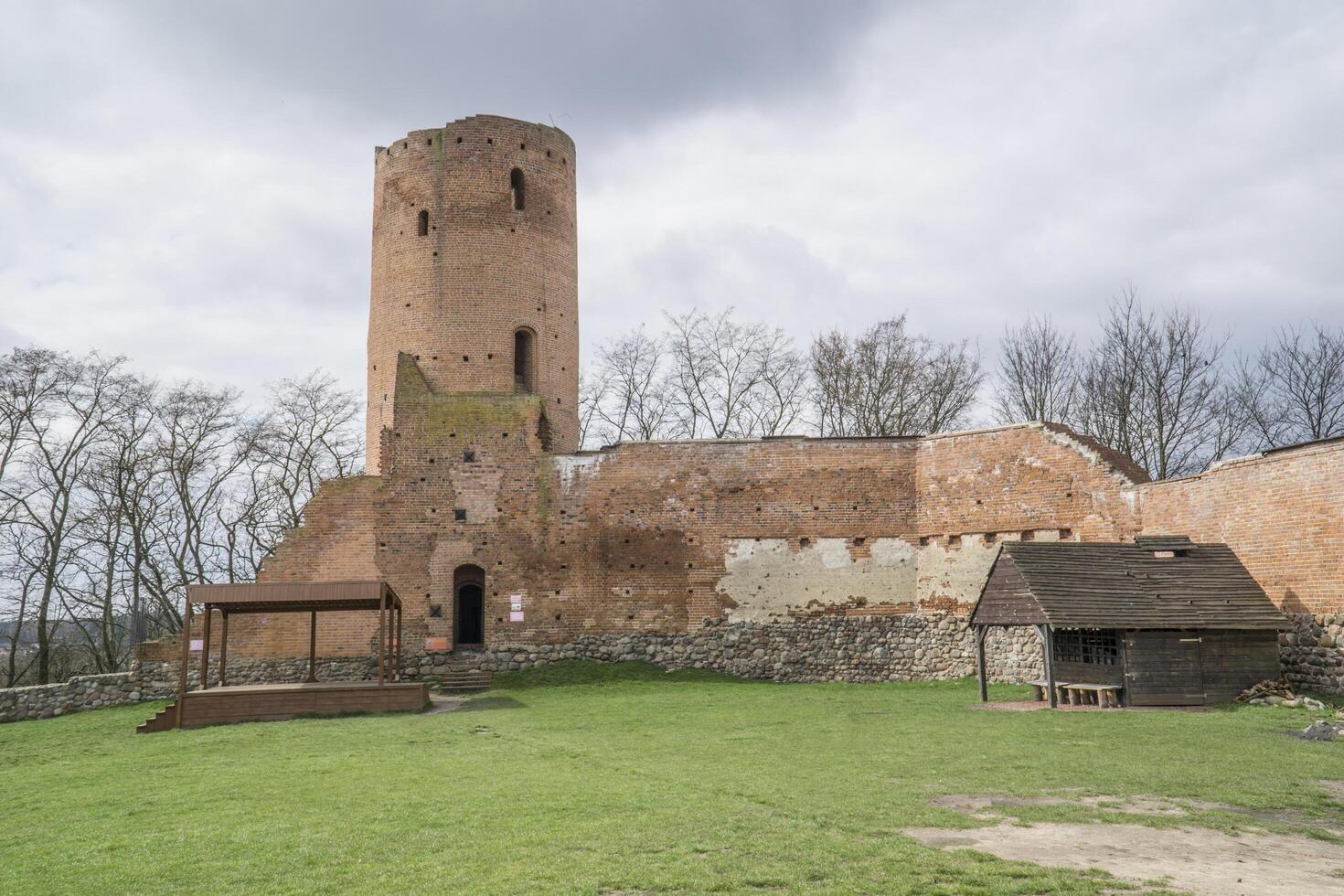 Czersk, Poland - March 24th, 2024 - Castle of Masovian Dukes - Tower, Defensive Wall and Courtyard photo