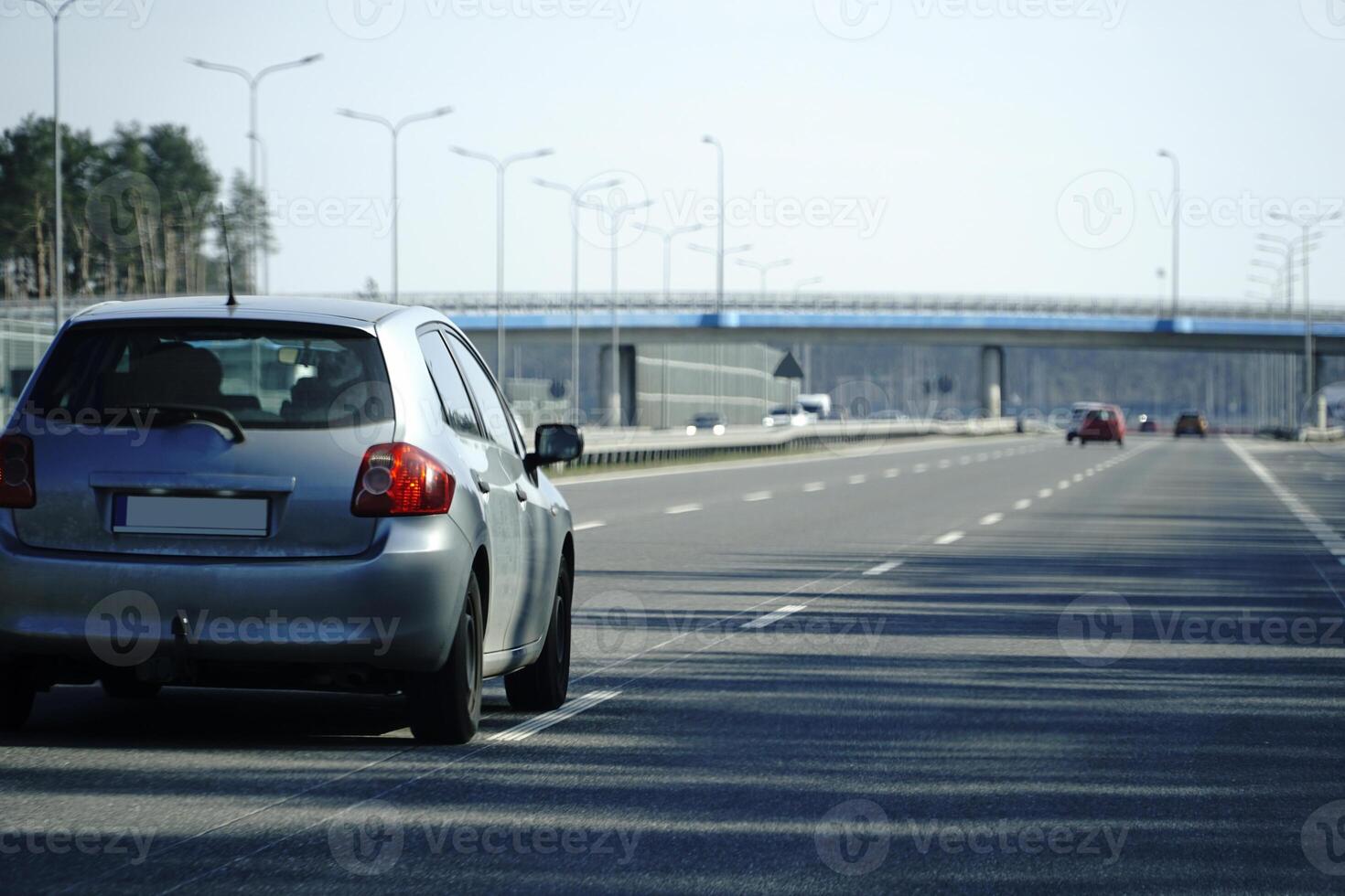 Cars Drive on a Highway photo