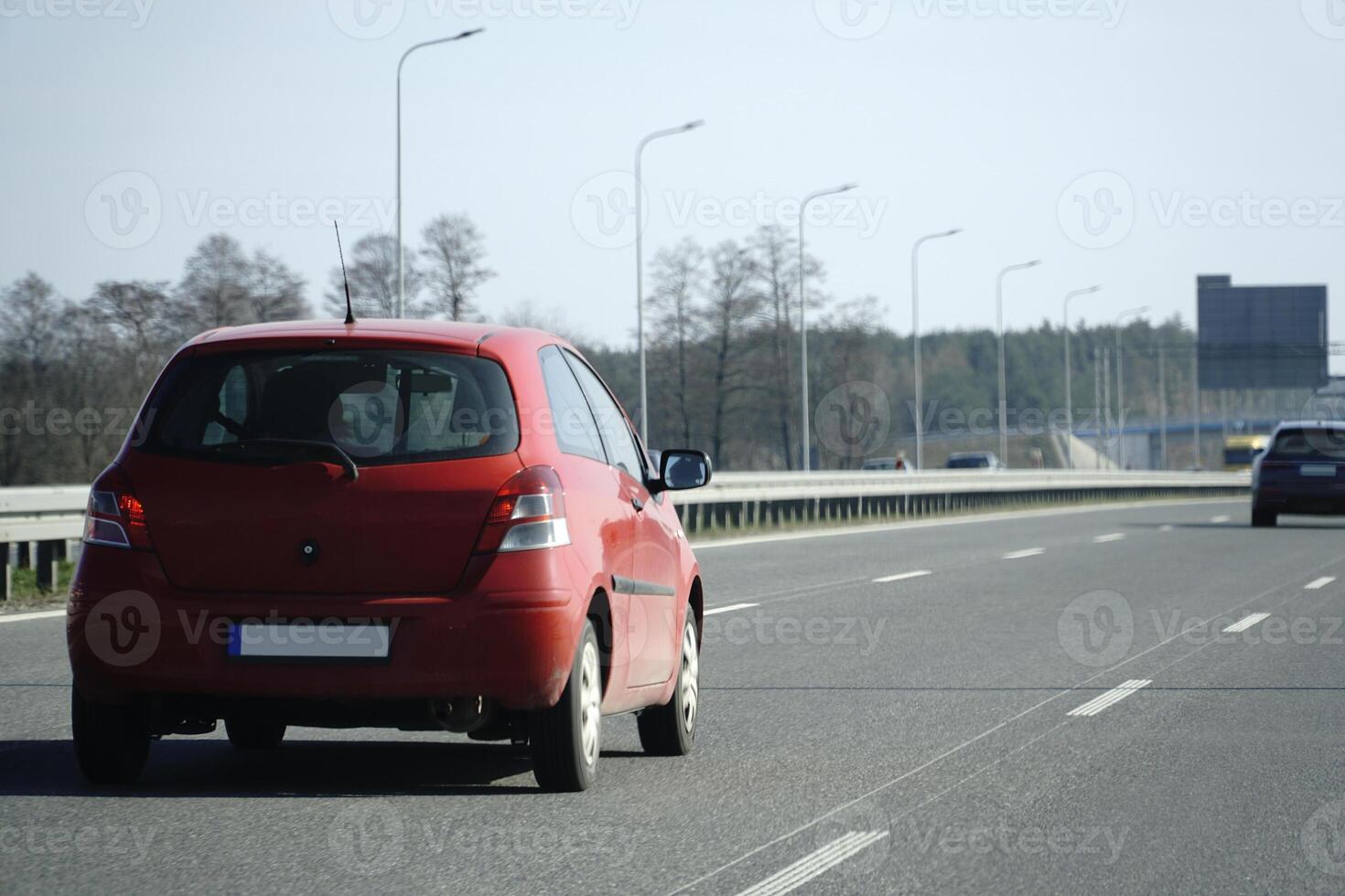 Cars Drive on a Highway photo