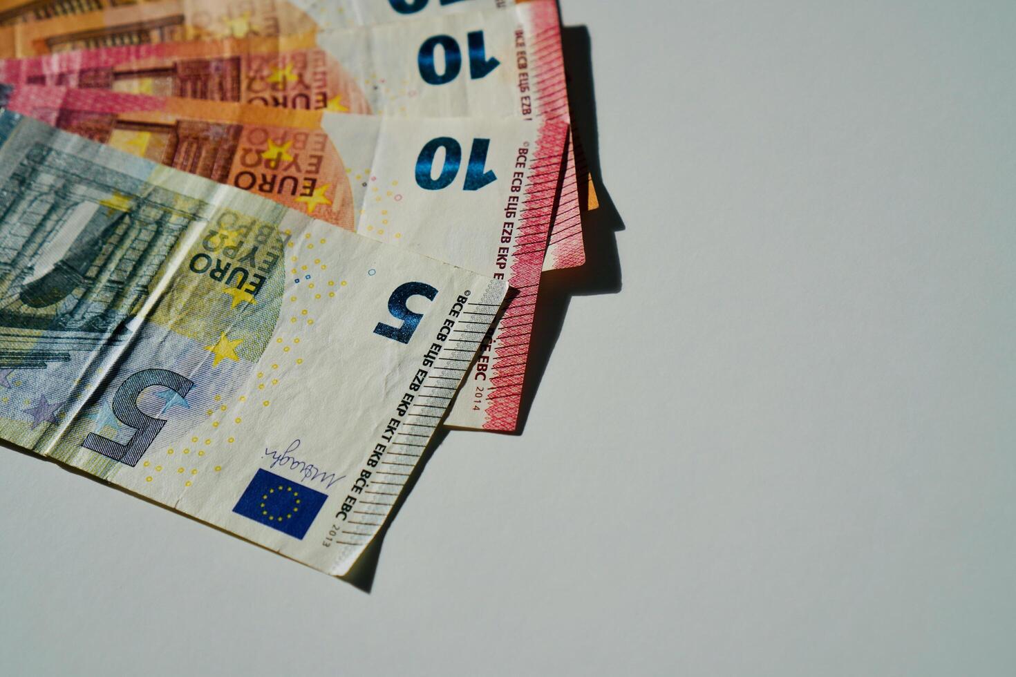 euro banknotes and coins photo