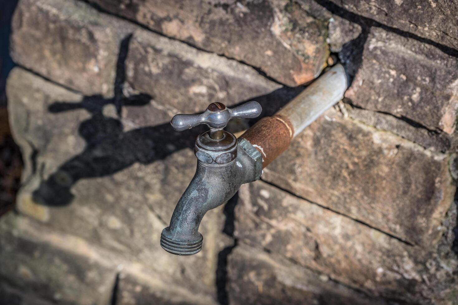 Outdoor water spigot photo