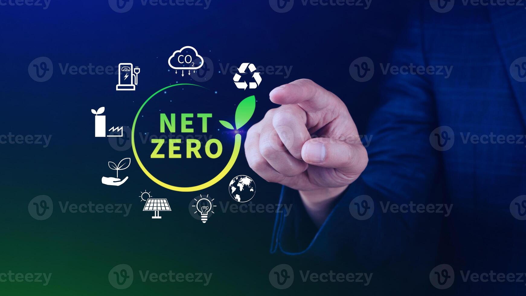 Net Zero and Carbon Neutral Concepts, Net zero greenhouse gas emissions target, Climate neutral long strategy, Businessman holding NetZero icon. photo