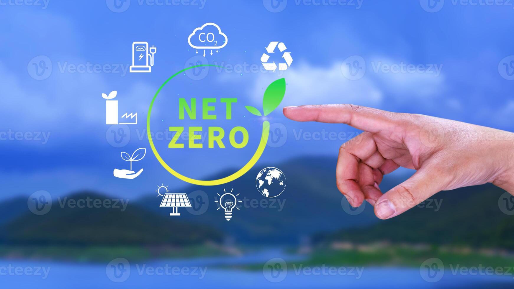 Net Zero and Carbon Neutral Concepts, Net zero greenhouse gas emissions target, Climate neutral long strategy, Businessman holding NetZero icon. photo