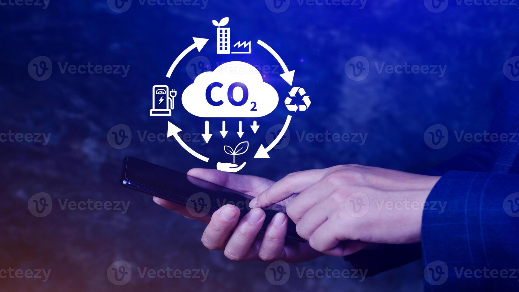 CO2 reducing icon using smartphone for decrease CO2, carbon footprint and carbon credit to limit global warming from climate change, Bio Circular Green Economy concept. photo
