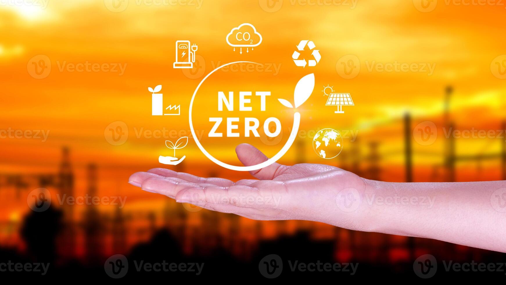 Net Zero and Carbon Neutral Concepts, Net zero greenhouse gas emissions target, Climate neutral long strategy, Businessman holding NetZero icon. photo
