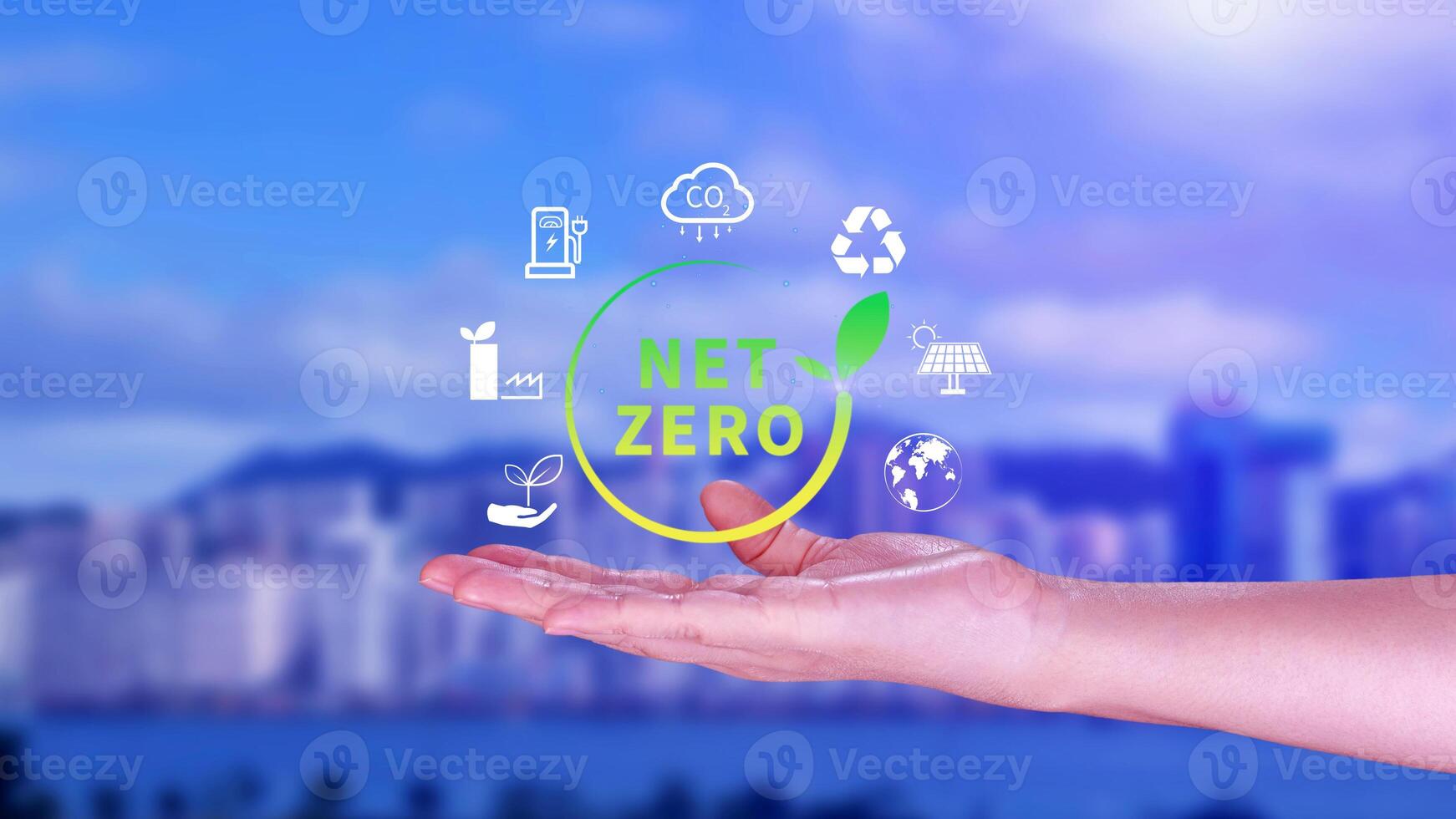 Net Zero and Carbon Neutral Concepts, Net zero greenhouse gas emissions target, Climate neutral long strategy, Businessman holding NetZero icon. photo
