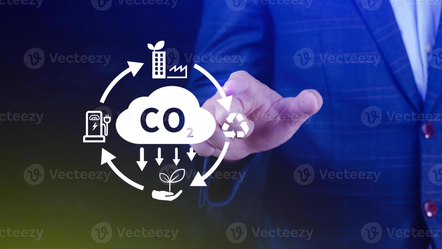 Hand holding CO2 reducing virtual icon for decrease carbon dioxide emission, carbon footprint and carbon credit to limit global warming from Bio climate change concept. photo