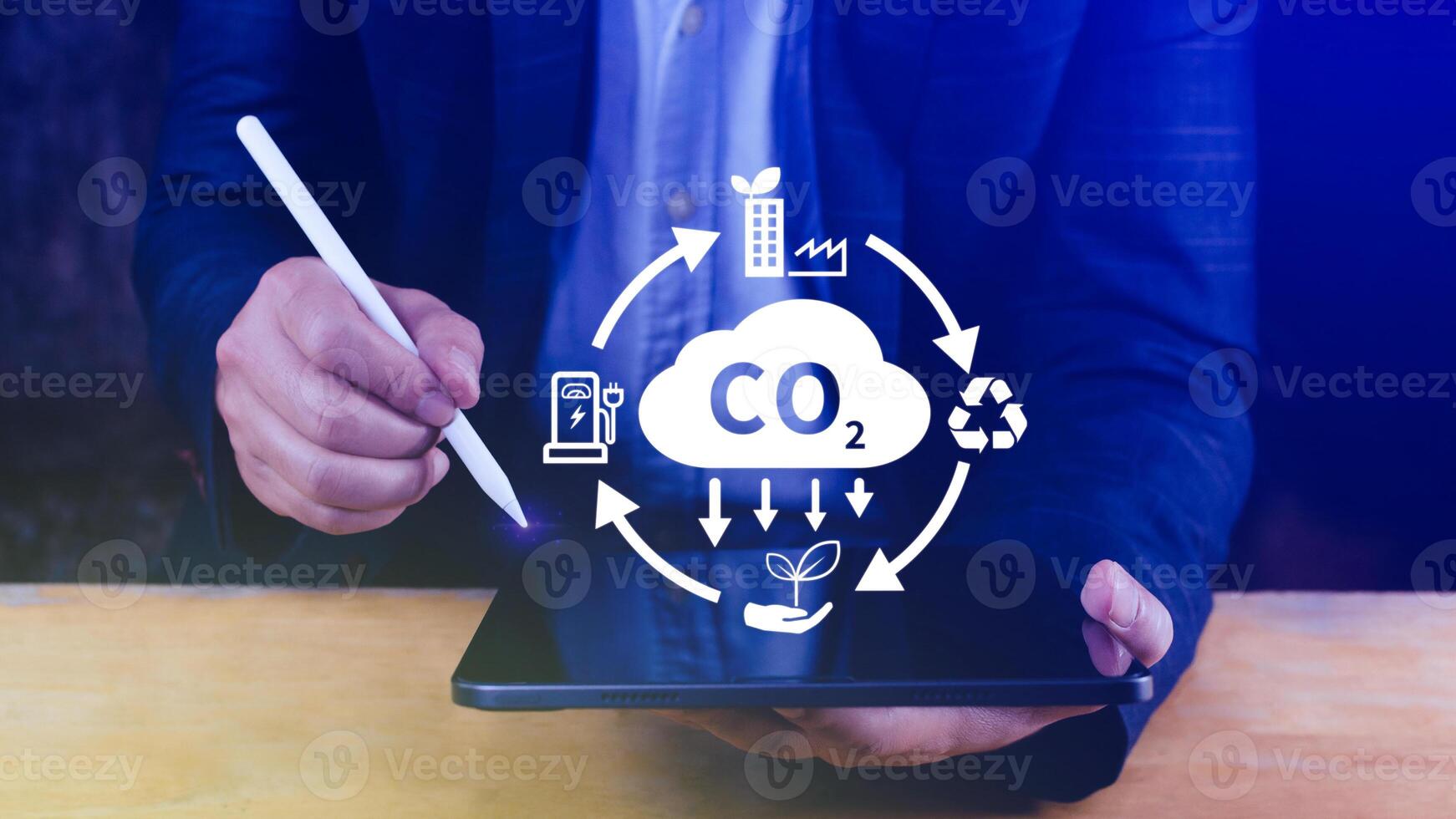 Hand holding CO2 reducing virtual icon for decrease carbon dioxide emission, carbon footprint and carbon credit to limit global warming from Bio climate change concept. photo