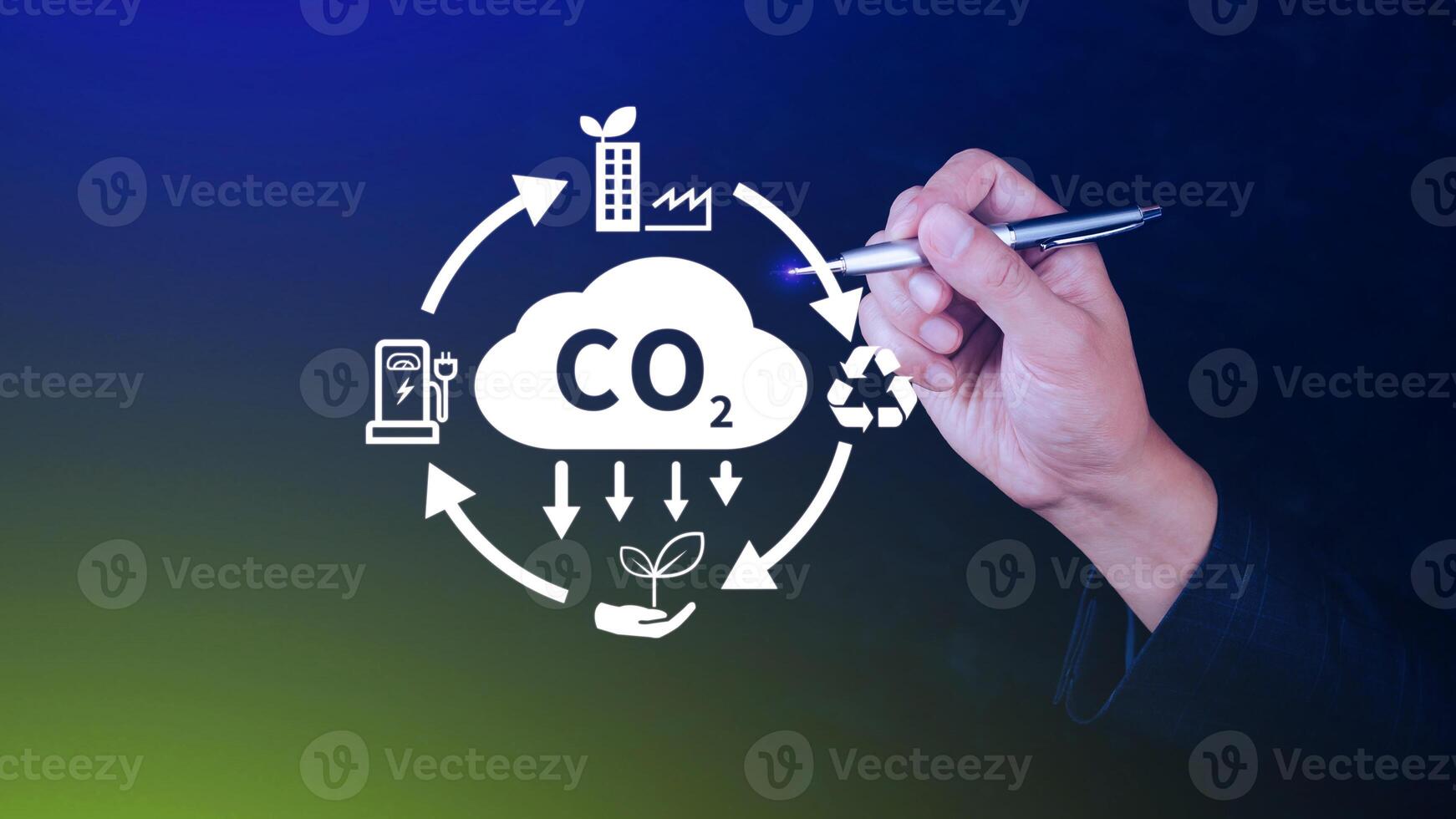 Hand holding CO2 reducing virtual icon for decrease carbon dioxide emission, carbon footprint and carbon credit to limit global warming from Bio climate change concept. photo