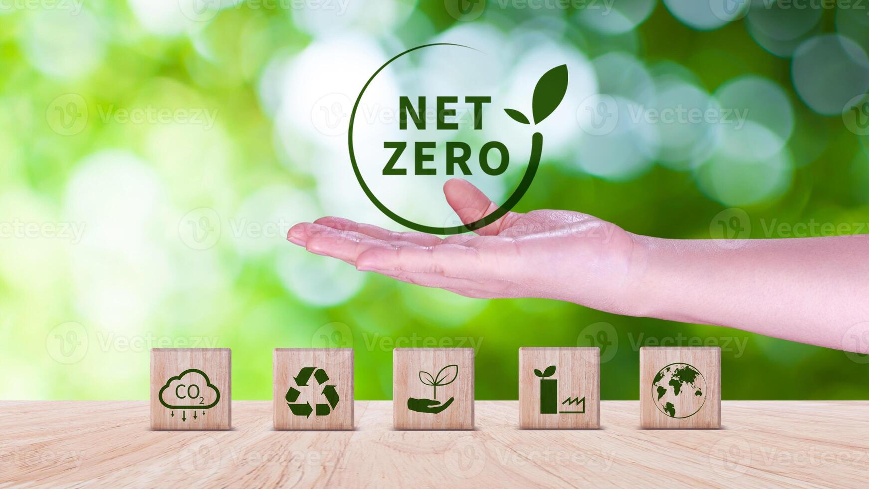 Net Zero and Carbon Neutral Concepts, Net zero greenhouse gas emissions target, Climate neutral long strategy. Wooden cubes with NetZero icon. photo