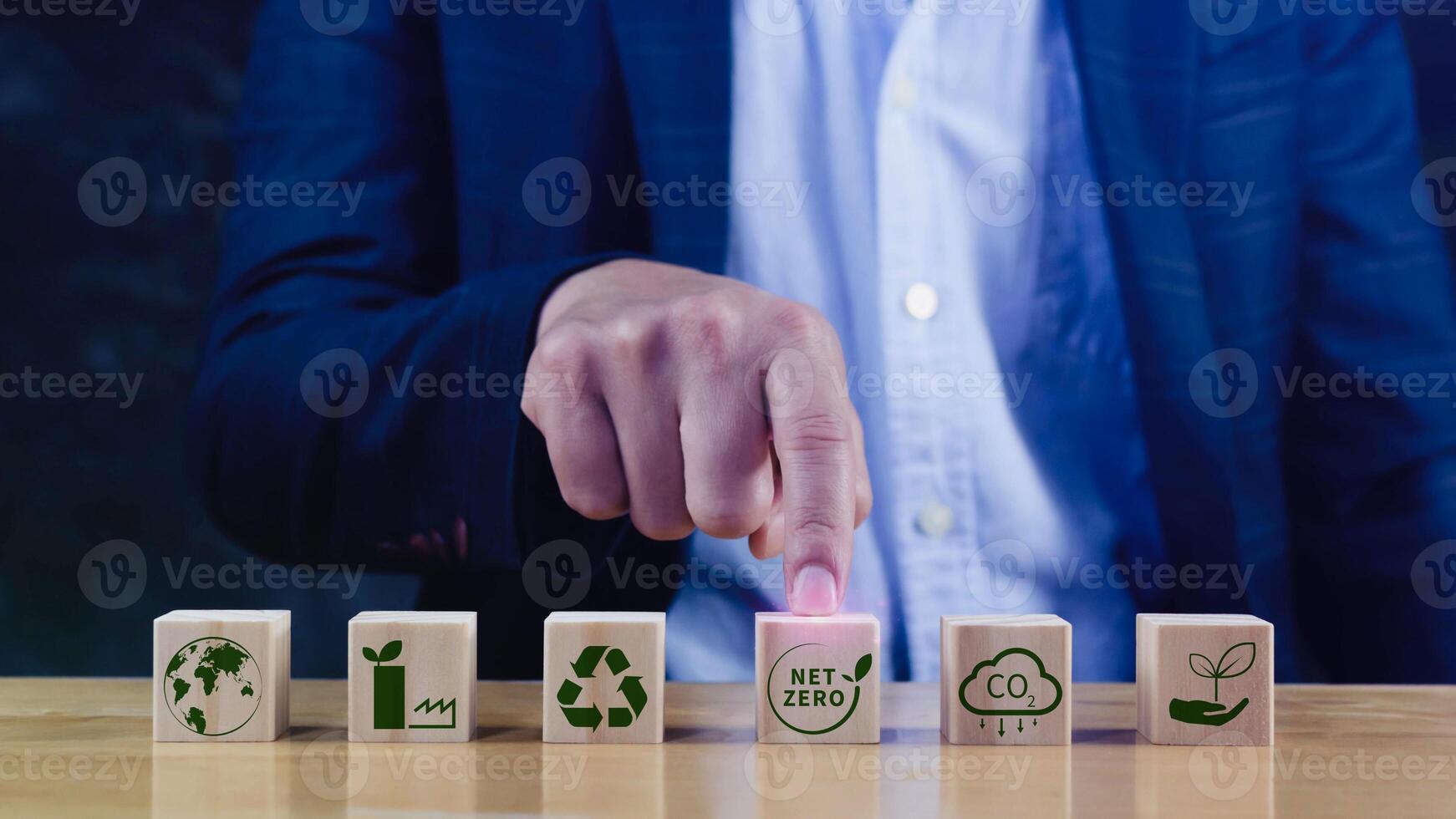 Net Zero and Carbon Neutral Concepts, Net zero greenhouse gas emissions target, Climate neutral long strategy. Wooden cubes with NetZero icon. photo